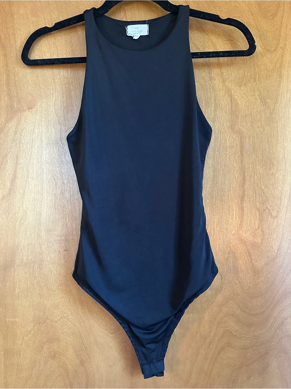 Sleek Black High-Neck Bodysuit